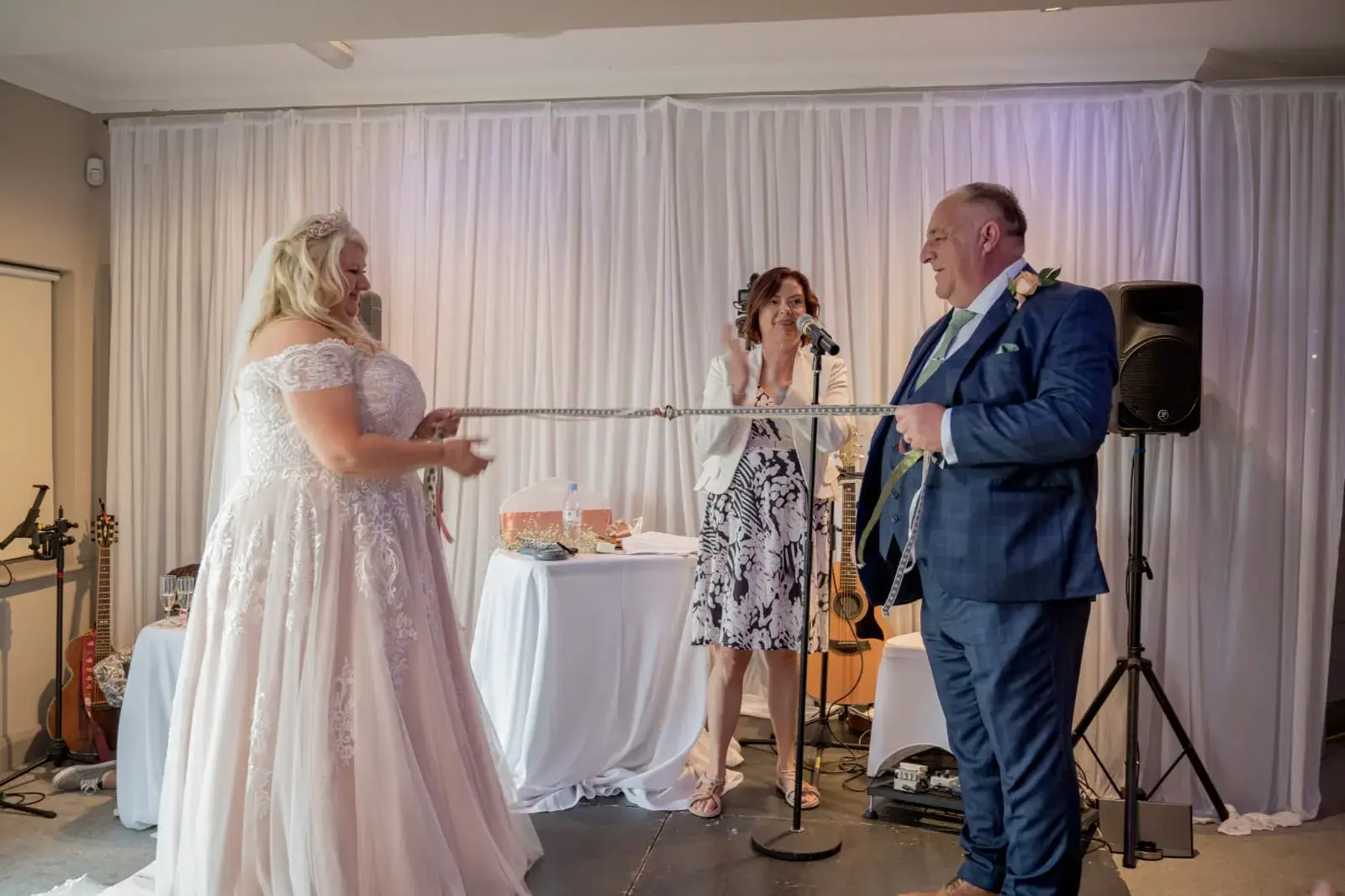 Bride and Groom completing hand fasting ceremony